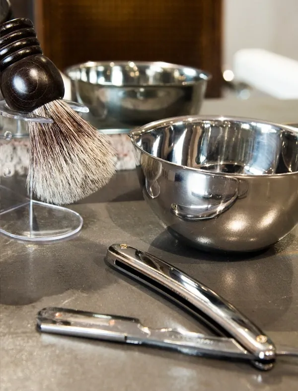 Ambient de la barberia El Barber BCN — maó vist i mosaic català a Gràcia, Barcelona